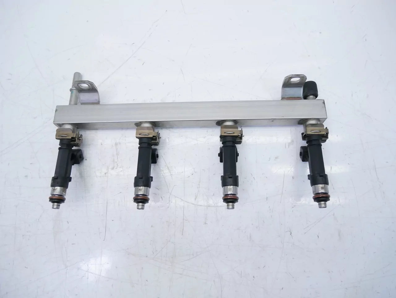 Rampa de inyectores Opel 1,2 gasolina A12XER LDC x 55562258