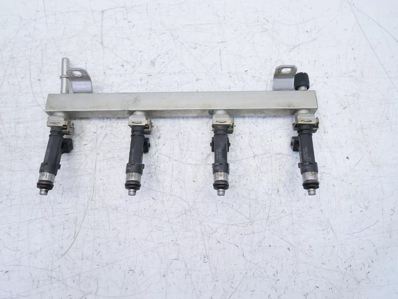 Rampa de inyectores Opel Vauxhall 1,2 L08 A12XER LDC A12 55562258