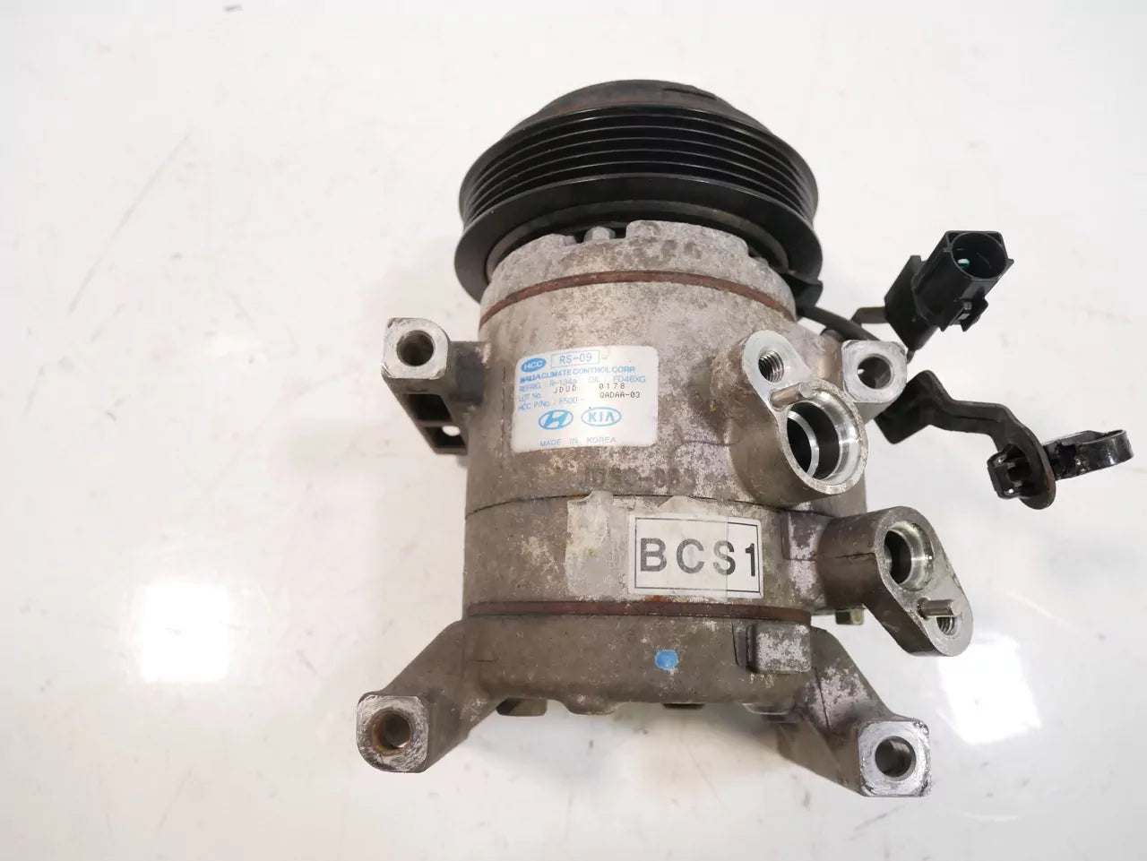 Compresor de aire acondicionado Hyundai i10 I10 1.2 gasolina G4LA 97701B9000