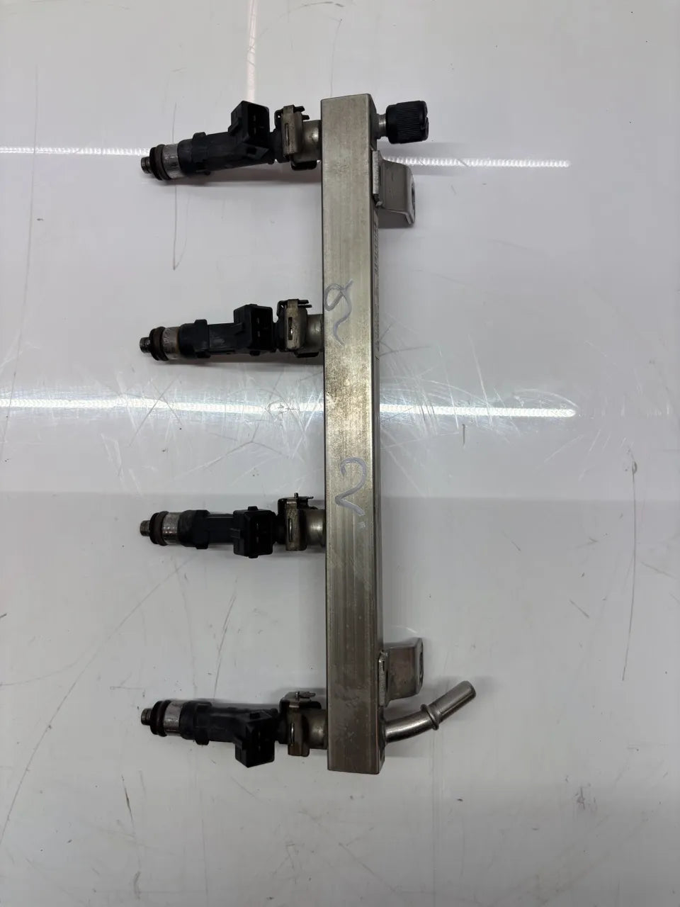 Riel inyector Opel 1.2 gasolina A12XER LDC 55562258