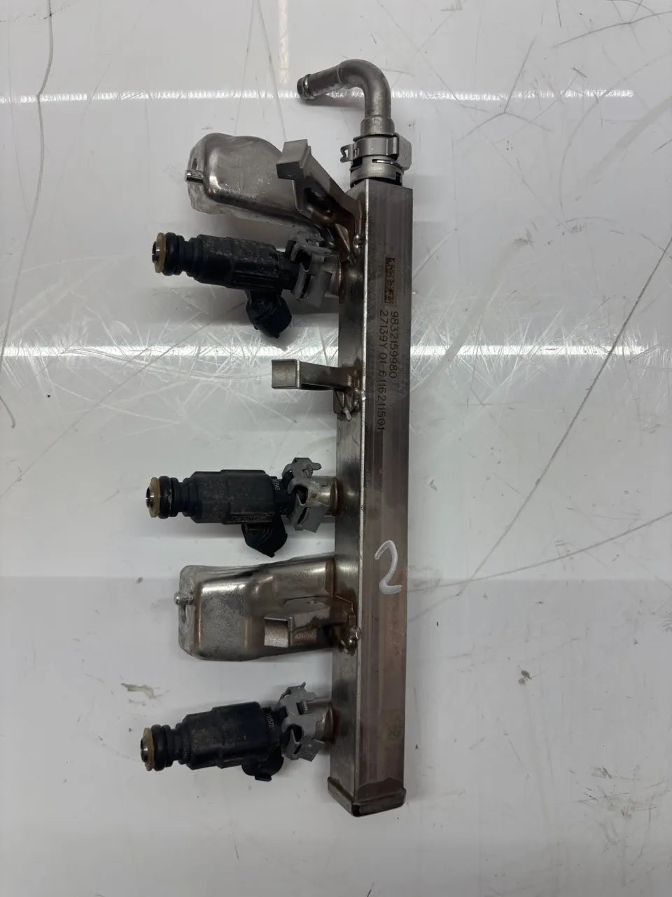 Rail de inyectores Opel Corsa F 1.2 gasolina EB2FAD HMH HM05 9832159980