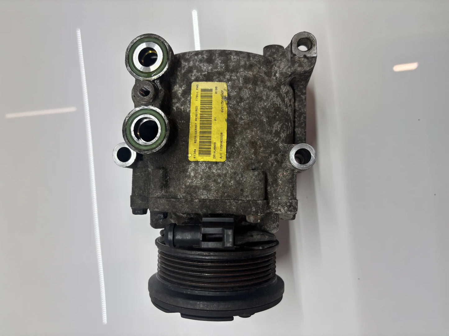 Compresor de aire acondicionado Ford Fiesta VI 1.25 gasolina STJB 8V51-19D629-EG