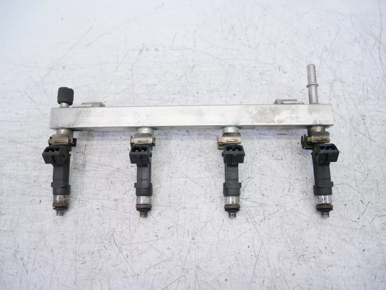 Rampa de inyectores Opel 1,2 gasolina A12XER 55562258