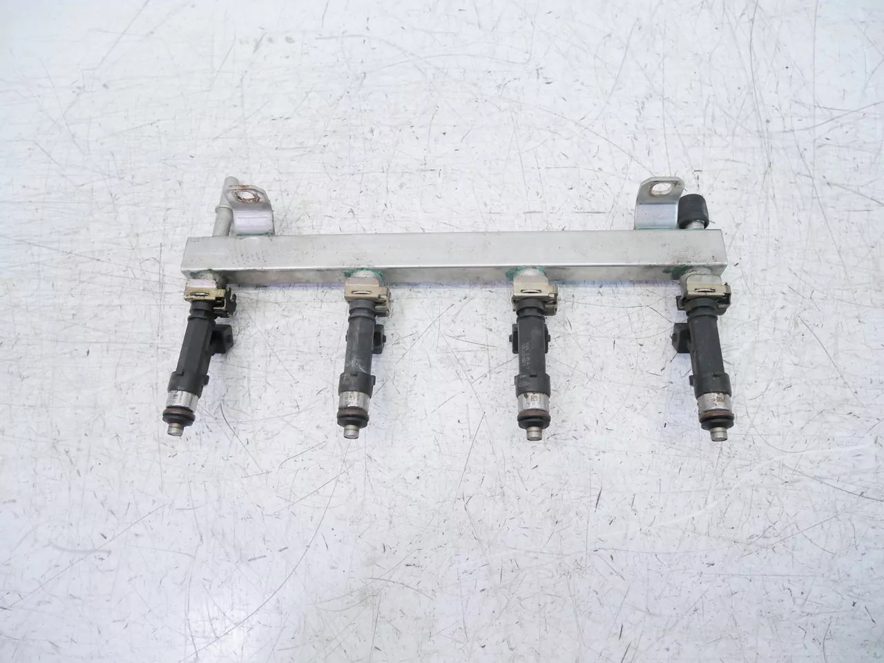 Rampa de inyectores Opel 1,2 gasolina A12XER 55562258