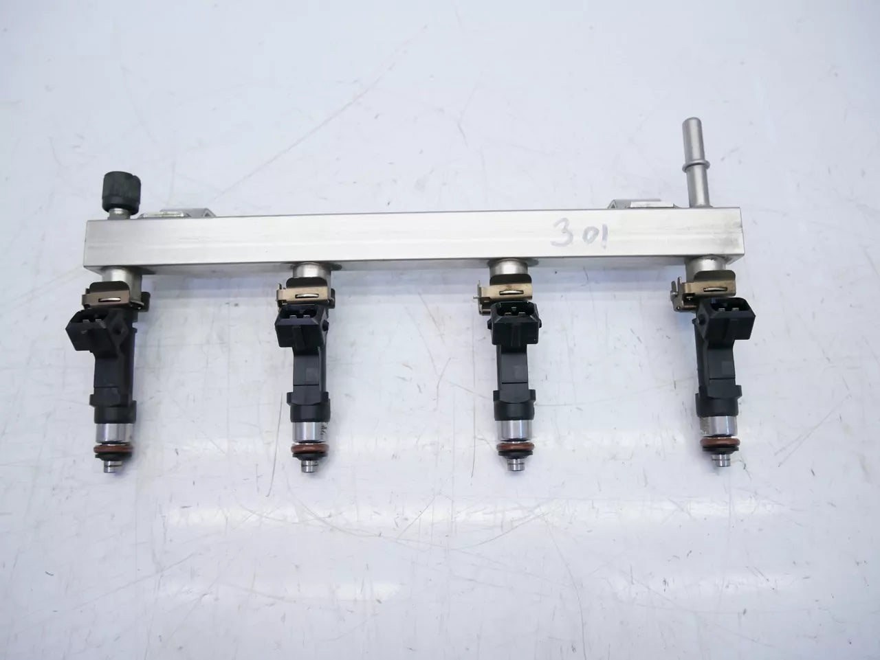 Rampa de inyectores Opel 1,2 gasolina A12XER LDC x 55562258