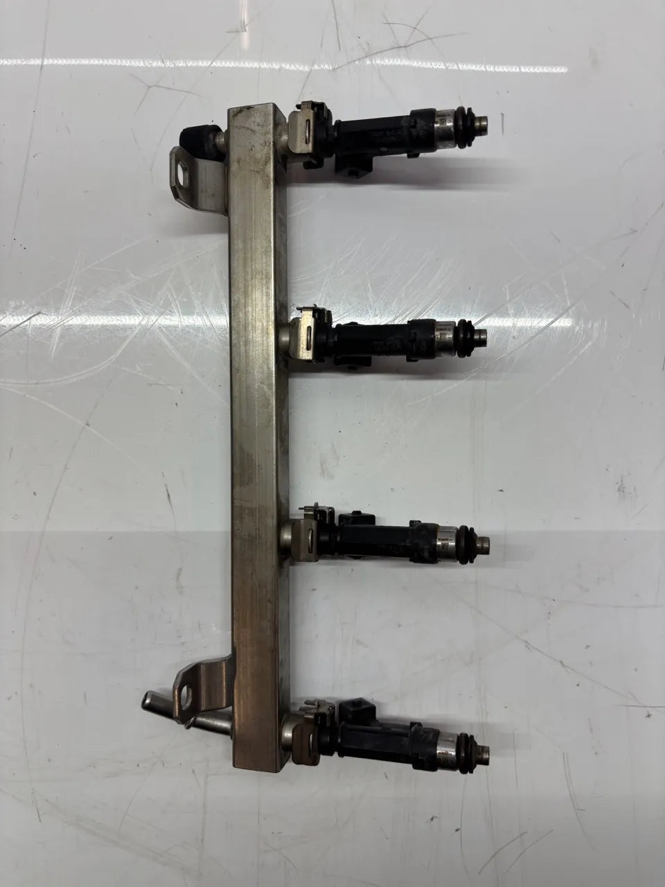 Riel inyector Opel 1.2 gasolina A12XER LDC 55562258