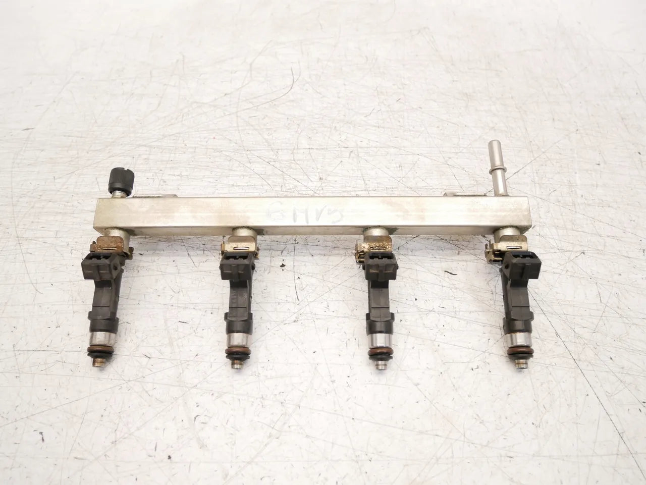 Rail de inyectores Opel Corsa D 1.2 A12XER 55562258 0280151239