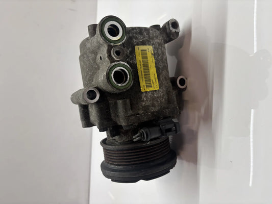 Compresor de aire acondicionado Ford Fiesta VI 1.25 gasolina STJB 8V51-19D629-EG